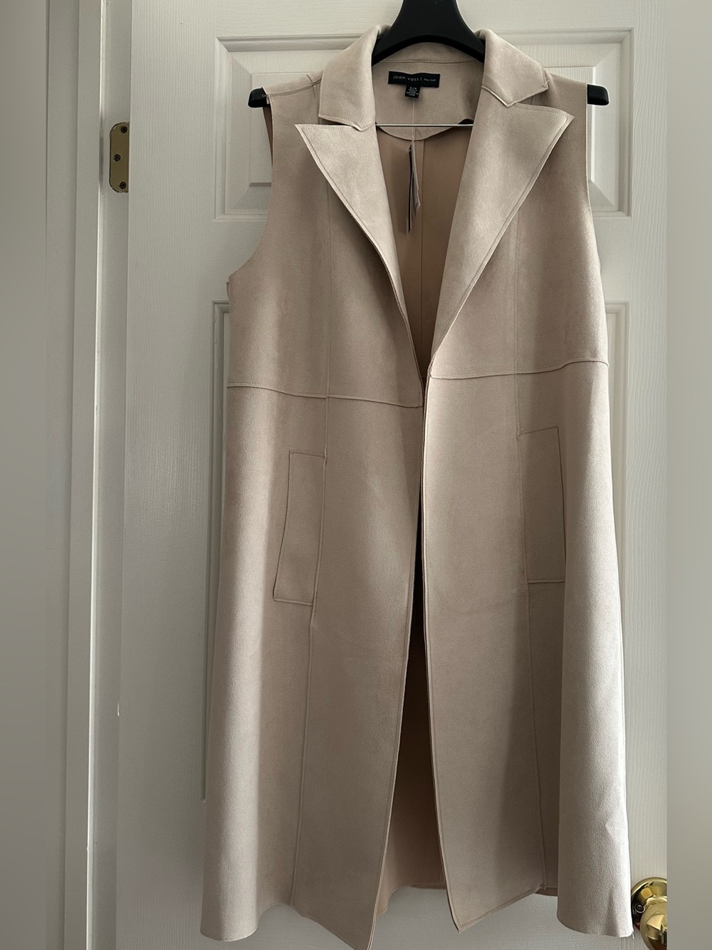 Light beige sleeveless longline trench vest